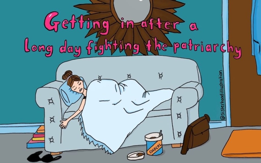Cartoon like drawing - person lying exhausted on couch, covered by blanket, bra on the ground, open pot of chocolate on the ground. text reads: "getting in after a long day fighting the patriarchy"